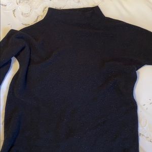 Beautiful unused black and light shimmer sweater